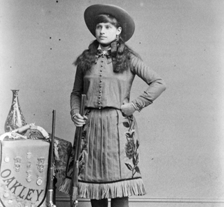 DPL415589 Miss Annie Oakley, Little Sure Shot, Buffalo Bill's Wild West, c. 1890-1900 (b/w photo) by Elliott & Fry Studio/ Denver Public Library
